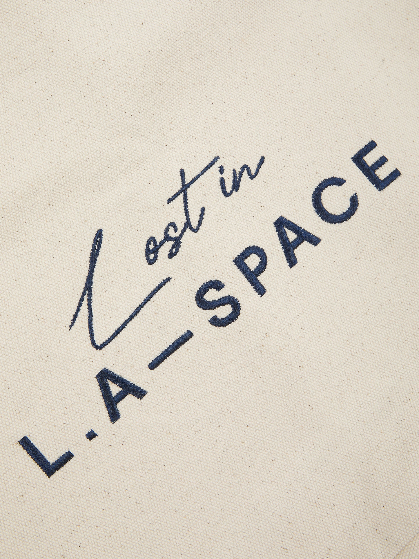 'LOST IN L.A-S' EMBROIDERED TOTE BAG IN CREAM