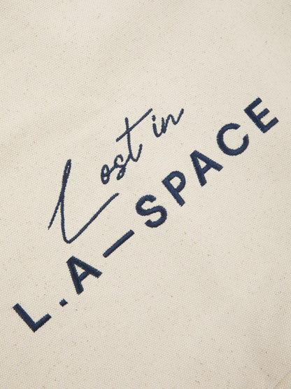 'LOST IN L.A-S' EMBROIDERED TOTE BAG IN CREAM