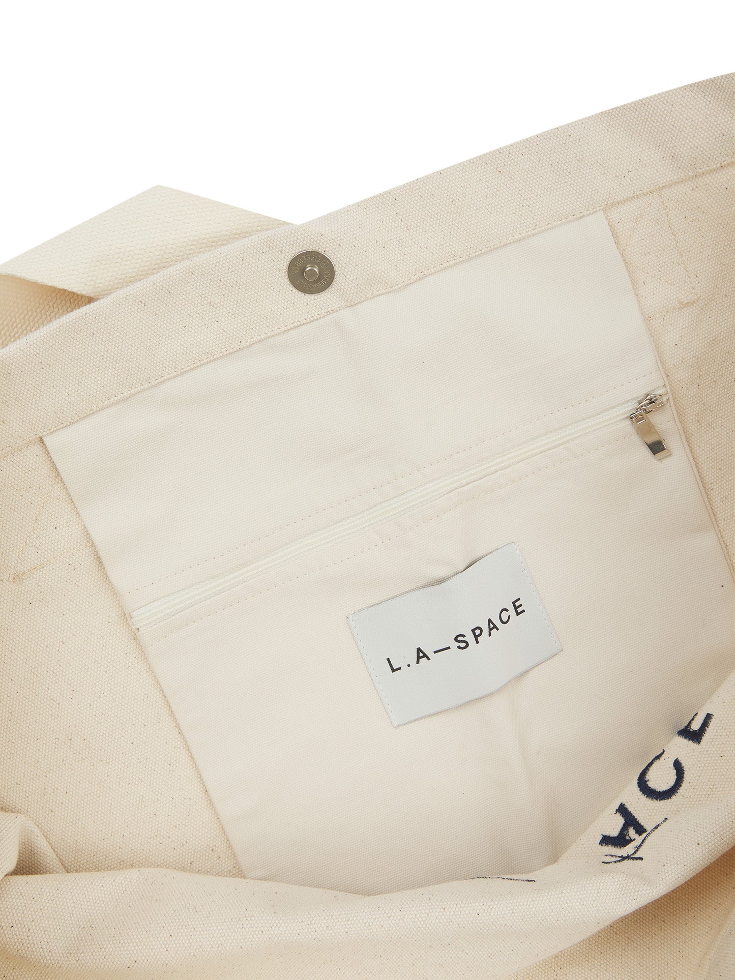 'LOST IN L.A-S' EMBROIDERED TOTE BAG IN CREAM